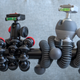 The flexible legs on the new PodZilla tripod (right) can be bent to a tighter radius than the GorillaPod (left) can be.